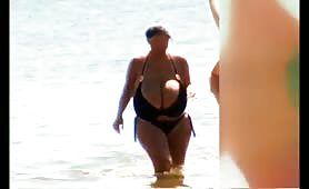 Big boobs slave handjob cock on beach